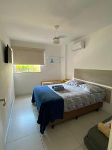 เตียงในห้องที่ APARTAMENTO EM ARRAIAL DO CABO - RJ