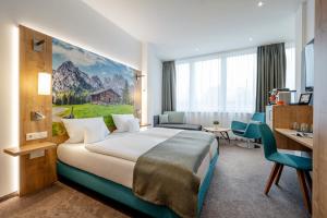 Postel nebo postele na pokoji v ubytování AVALON Hotel Bad Reichenhall