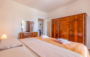 Posteľ alebo postele v izbe v ubytovaní Apartment Melanie