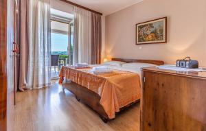 Posteľ alebo postele v izbe v ubytovaní Apartment Melanie