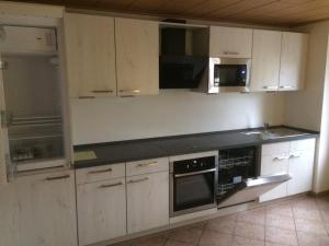 Kuchyň nebo kuchyňský kout v ubytování Guesthouse Elbsandstein App. Bastei