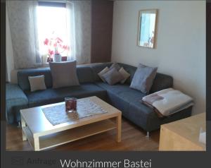 Posezení v ubytování Guesthouse Elbsandstein App. Bastei