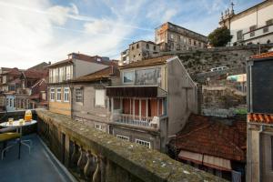 a view from a balcony of a city with buildings at Being Porto Hostel in Porto