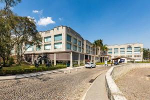 a building on the side of a road at Antigua Hotel Boutique in Mexico City +30 photos