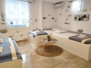 Säng eller sängar i ett rum på Villa Adriana