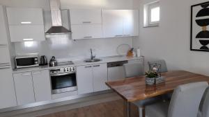 Elite Apartment Jasmina tesisinde mutfak veya mini mutfak