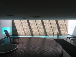 Vista de la piscina de Dos Orillas - Apartamento 510 o d'una piscina que hi ha a prop