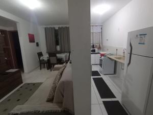 Η κουζίνα ή μικρή κουζίνα στο Apto 1 Agua Marinha +7 φωτογραφίες