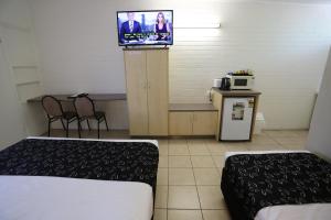 Kuchyň nebo kuchyňský kout v ubytování Tropic Coast Motel