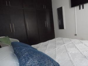 Postel nebo postele na pokoji v ubytování Departamento privado zona de la UACH