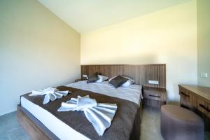 מיטה או מיטות בחדר ב-Private Honeymoon Villa