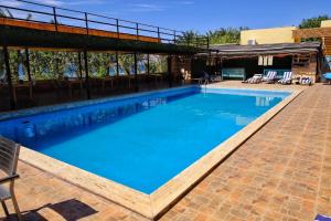 Bazén v ubytování Darna Divers Village nebo v jeho okolí