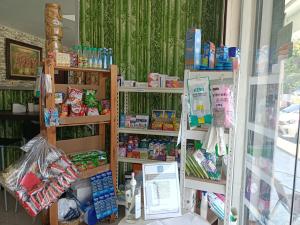 a room with shelves of products in a store at Casa Hotel near KLIA 1 in Sepang