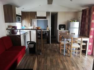 Küche/Küchenzeile in der Unterkunft Location Mobil Home