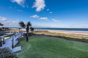 a view of the beach from the deck of a beach house at Ponte Vedra Ocean Manor 106-D in Ponte Vedra