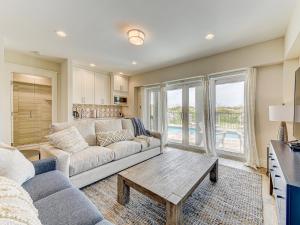 a living room with a couch and a table at The View in Saint Augustine