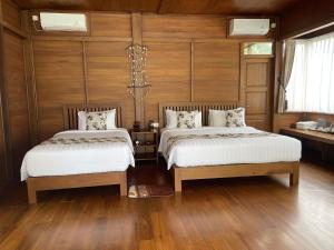 Voodi või voodid majutusasutuse Leebong Island Resort toas
