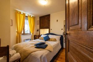 Postel nebo postele na pokoji v ubytování Relax Cottage In Vercana