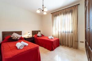 Postel nebo postele na pokoji v ubytování Finca San Antonio Holiday Rental + 18 fotografií