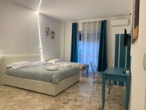 Posteľ alebo postele v izbe v ubytovaní Catania Apartment Borgo Suite Autonomous