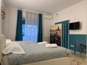 Posteľ alebo postele v izbe v ubytovaní Catania Apartment Borgo Suite Autonomous