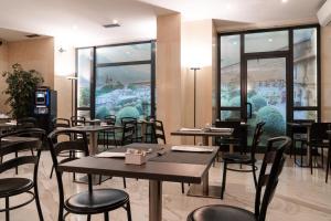 A restaurant or other place to eat at Hotel Buonconsiglio