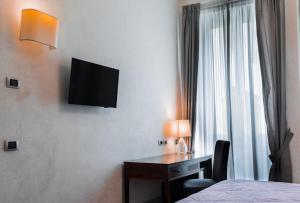A television and/or entertainment centre at Il Salotto Di Firenze