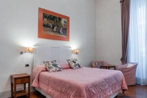 A bed or beds in a room at Il Salotto Di Firenze