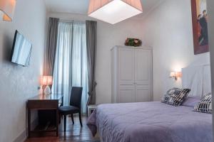 A bed or beds in a room at Il Salotto Di Firenze