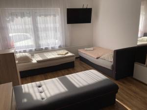 Posteľ alebo postele v izbe v ubytovaní Pokoje Bielsko + 7 fotografií
