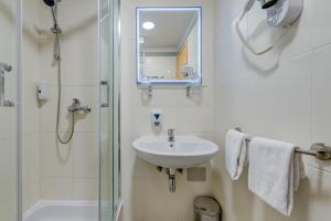 Ένα μπάνιο στο Hotel Pax