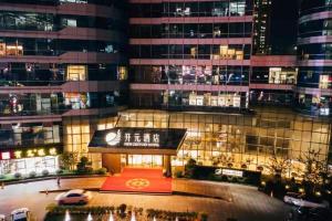 Reštaurácia alebo iné gastronomické zariadenie v ubytovaní New Century Hotel Qianchao Hangzhou