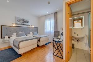 Ένα μπάνιο στο Hotel Pax