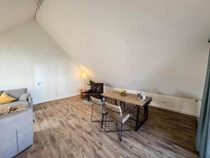 Χώρος καθιστικού στο Kapitaenshaus-Lassen-Zimmer-Columbus-Suite +11 φωτογραφίες