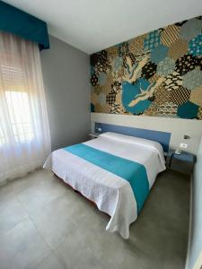 Postel nebo postele na pokoji v ubytování Hotel Master