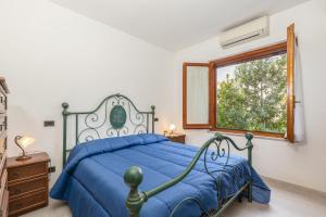 En eller flere senge i et værelse på Casa Raftin