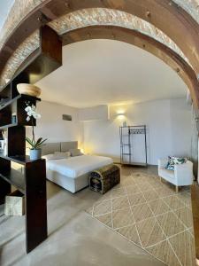 Postel nebo postele na pokoji v ubytování Corallini Luxury Apartments Shiro