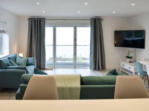 Posezení v ubytování Royal Cliff Luxury Apartments - The Bay