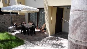 Patio alebo iná vonkajšia časť ubytovania Villetta Isola