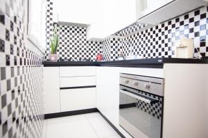 Kuchyňa alebo kuchynka v ubytovaní Lambrate Elegant Bright Apartment