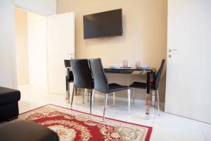 Televízia a/alebo spoločenská miestnosť v ubytovaní Lambrate Elegant Bright Apartment