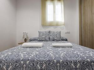 Säng eller sängar i ett rum på Cádiz caleta de cádiz 3