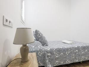 Posteľ alebo postele v izbe v ubytovaní Cádiz caleta de cádiz 3