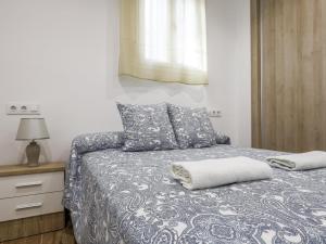 Posteľ alebo postele v izbe v ubytovaní Cádiz caleta de cádiz 3