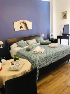 Cama o camas de una habitación en B&B Antonella