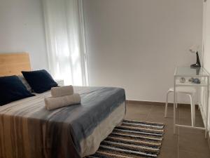 Posteľ alebo postele v izbe v ubytovaní Apartamento Río Iro