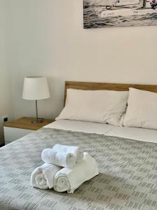 Кровать или кровати в номере Casa Meni