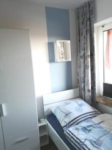 Postel nebo postele na pokoji v ubytování Ferienwohnung Asgard