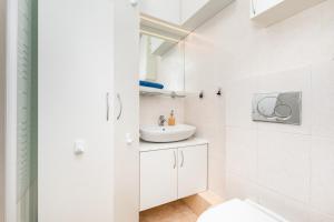 Kúpeľňa v ubytovaní Apartament Emilii Plater by Your Freedom + 14 fotografií