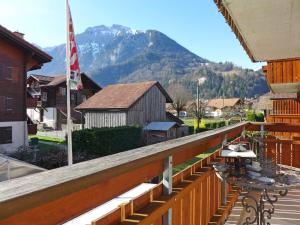 a balcony with a view of a mountain at Apartment Carina 4 4 by Interhome in Wilderswil